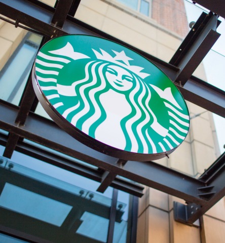 Closeup exterior storefront of Starbucks logo