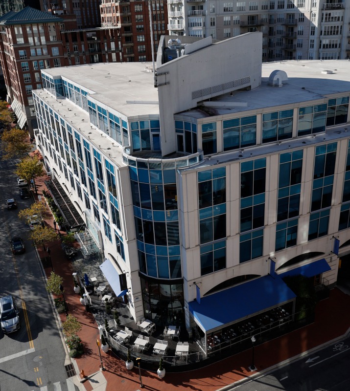 1000 Lancaster office building, a 5-story modern structure, from above
