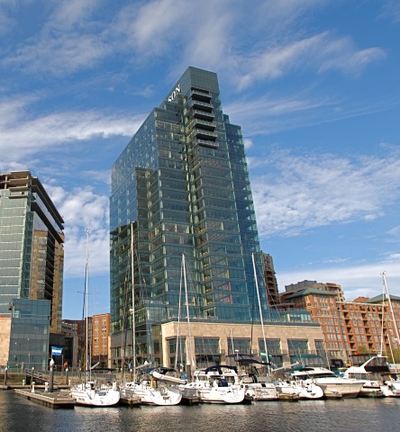 100 International large glass office building as seen from the Harbor East Marina