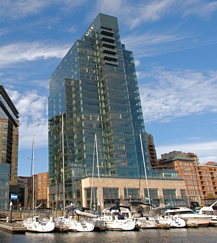 100 International large glass office building as seen from the Harbor East Marina