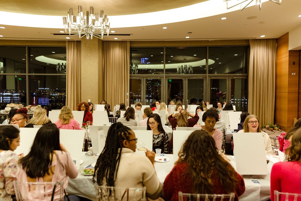 group of guests at paint and sip night at the four seasons